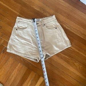 Reformation buttery cream colored Cowboy High rose denim shorts size 25